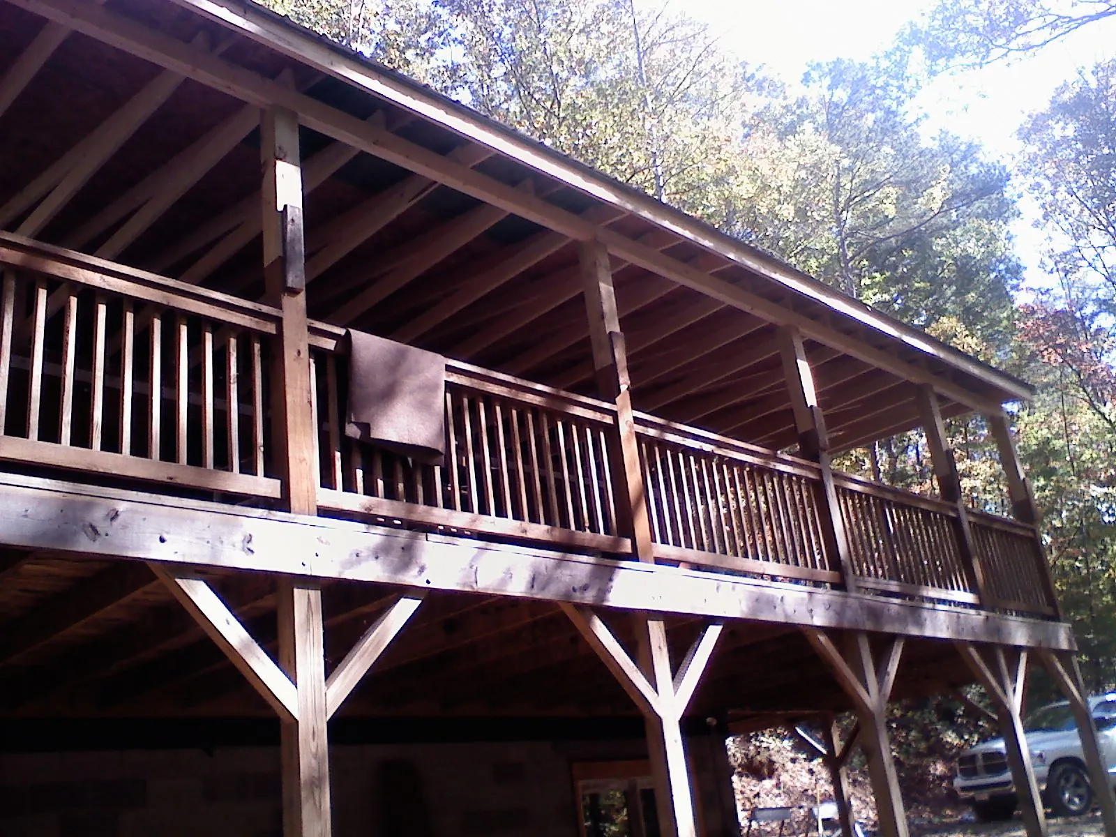 Timber framing under a new elevated porch and deck — Roof Leak Repair in Bosler by Roofing Brothers